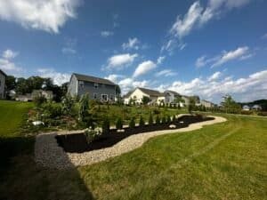 Landscaping Project with stones, planting, and mulch